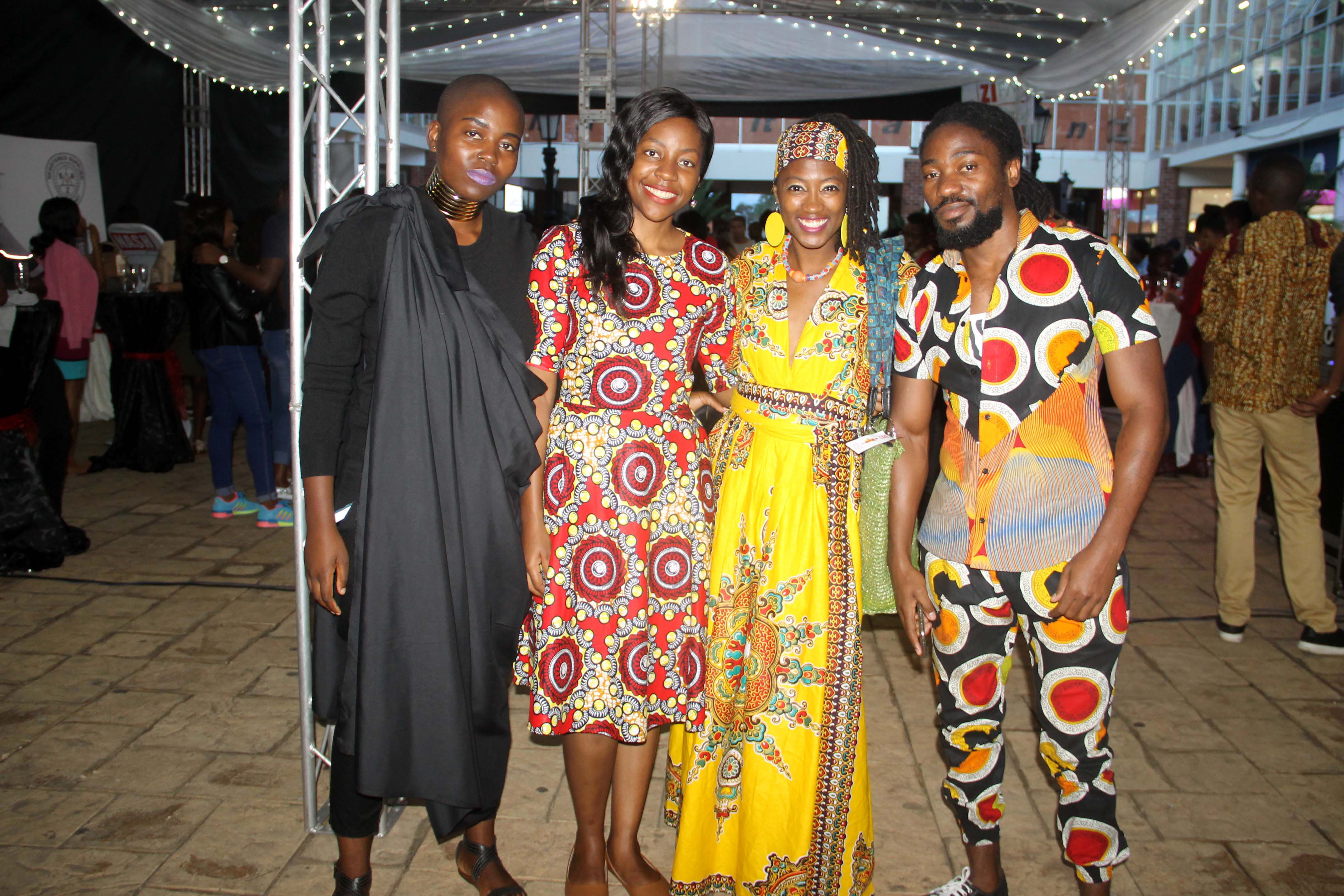 The Sunday Mail Leisure Reporter Andrew Moyo (Right) having a Kodak moment with some of the fans at the premiere  