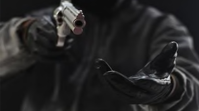 Police have launched a manhunt for 13 suspected armed robbers behind two separate robberies in Harare and Bulawayo on Tuesday, where victims lost US$100 000 in cash.