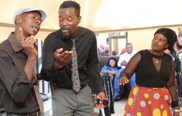 Talented comedian Taurai Boora (centre), son of the late actor Lazarus Boora, known as Gringo, joins other actors and actresses in a drama at the funeral of  Stella January in Mufakose